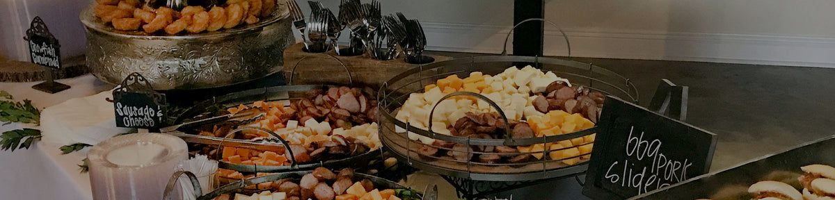 A Georgia Blue catering spread of meats, cheeses and sliders