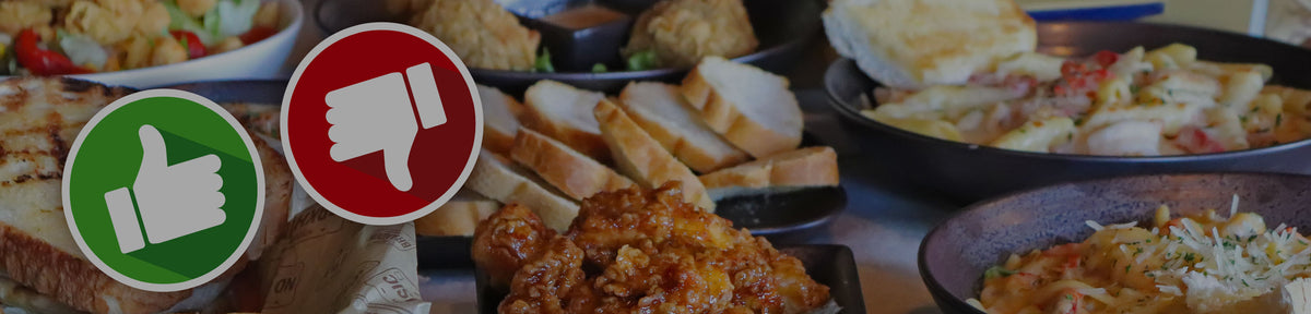 Thumbs up and thumbs down over a spread of Georgia Blue dishes