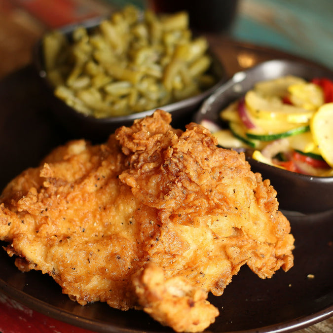Fried chicken blue plate with green beans and squash & zucchini